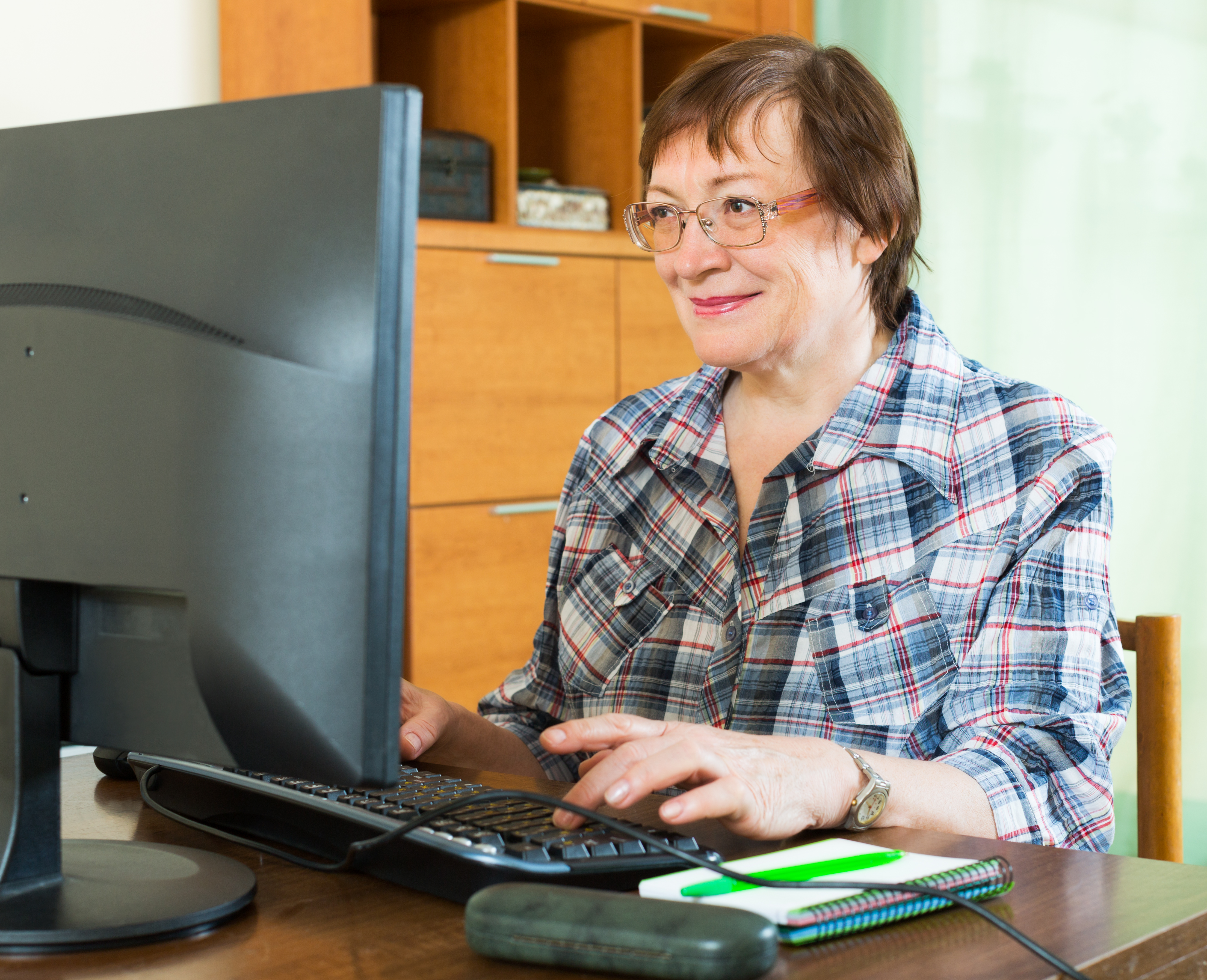 Never leave debriefing out of your planning. Elderly woman working with computer